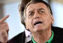 Brazil’s Bolsonaro ordered to wear ankle monitor ahead of trial